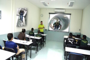 Onsite Rescue instructor training in a classroom with several students at desks